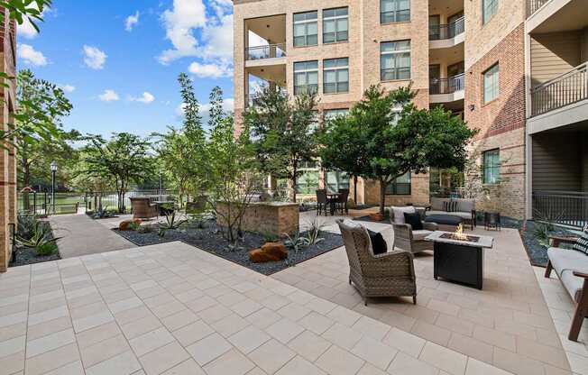 the preserve at ballantyne commons courtyard with furniture and trees