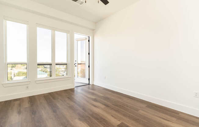 Living Room with Balcony and Hard Surface Flooring