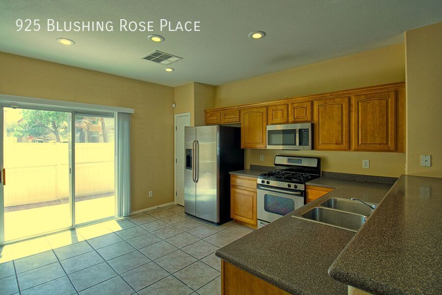 925 BLUSHING ROSE PL