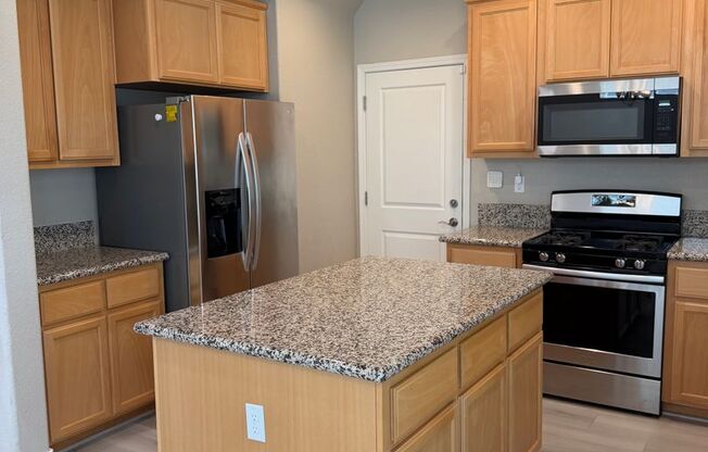 **Modern 3-Bedroom Home with 2-Car Garage & Included Appliances**
