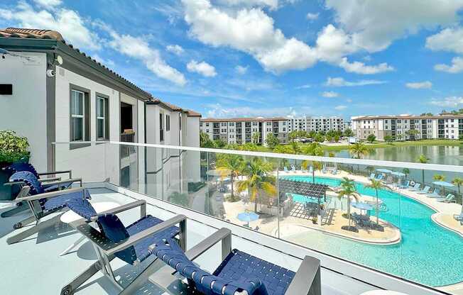 Rooftop terrace overlooking saltwater pool and private lake