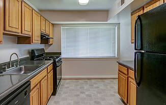 Kitchen with window at Leesburg Apartments in Leesburg VA