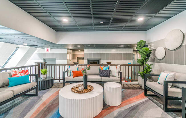 a resident clubhouse with couches and a coffee table