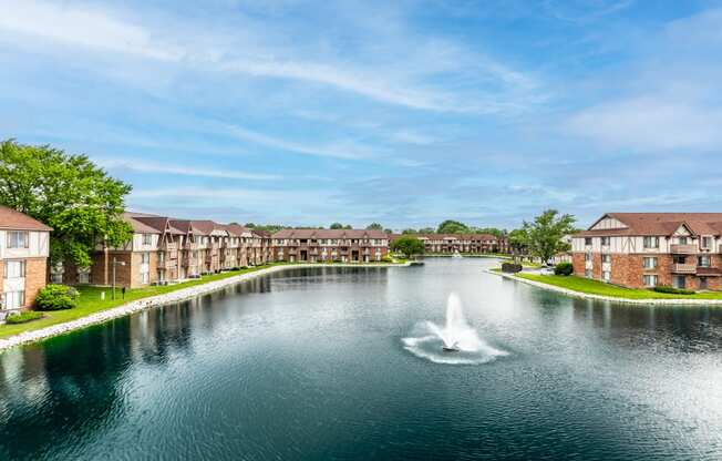 a fountain in the middle of a pond in Indianapolis, IN