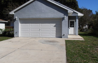 THREE BEDROOMS AND A TWO CAR GARAGE