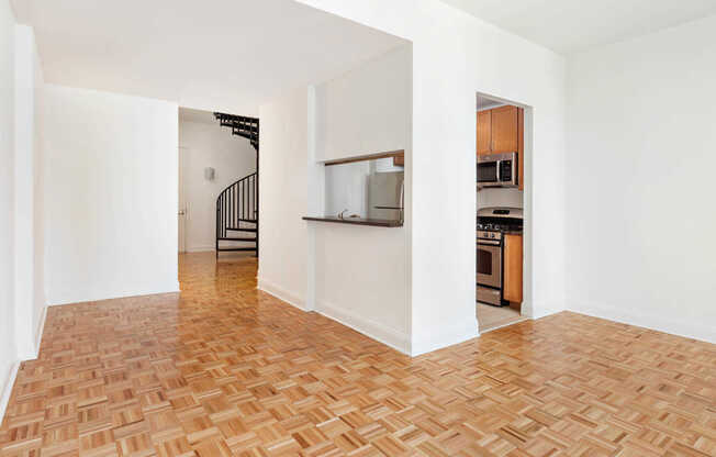 Kitchen and Dining Room with Parquet Wood Flooring