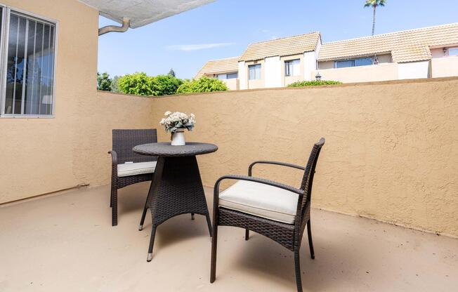 a chair sitting in front of a building