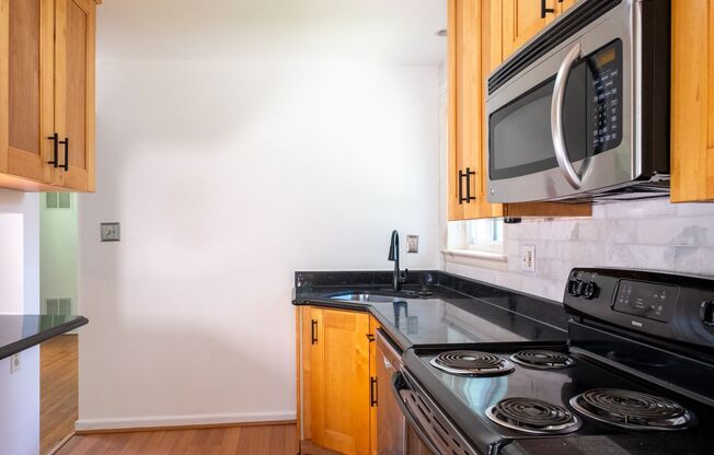 Charming Split-Level Home with Bright Interiors and Spacious Backyard