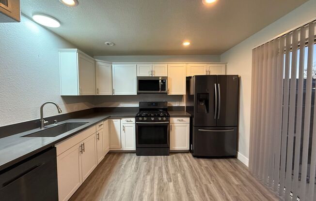$500 OFF 1ST MONTHS RENT Updated 3-Bedroom Townhome in Gated Community with Pool Access
