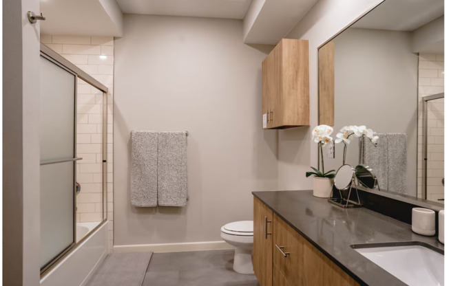 2 beds, 2 baths, 1,037 sqft, $1,225, Unit B-04/WHITE CABINET/ PARKING LOT VIEW