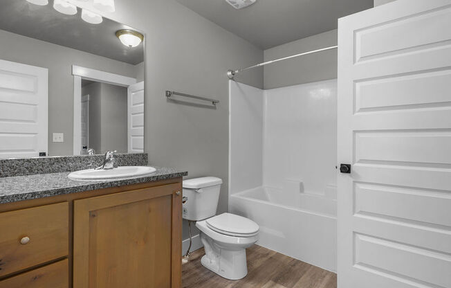 a bathroom with a toilet and a sink