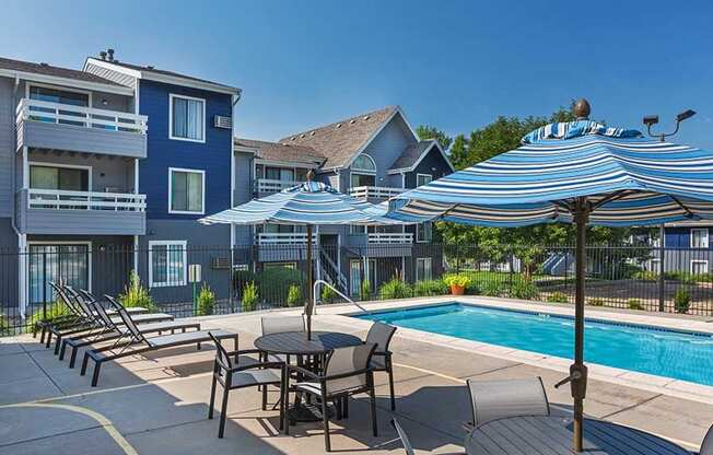 Swimming Pool With Relaxing Sundecks at Windmill Apartments, Colorado