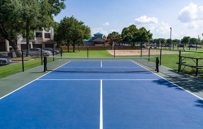 Serve up fun and friendly competition on the community pickleball court, perfect for casual games or regular play.