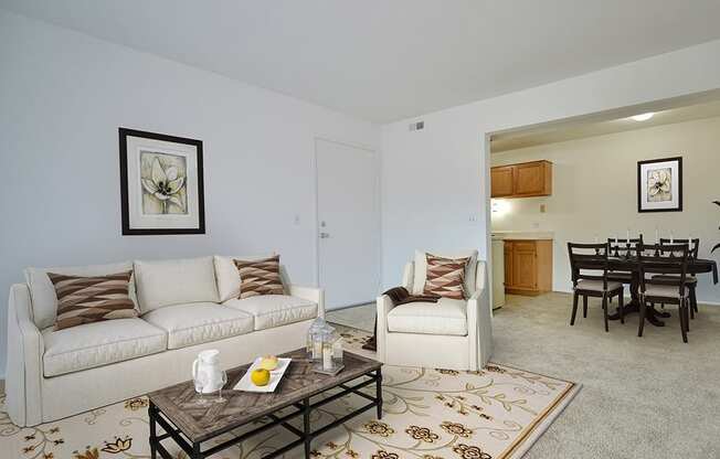 Living Room With Dining Area at Charter Oaks Apartments, Davison, Michigan