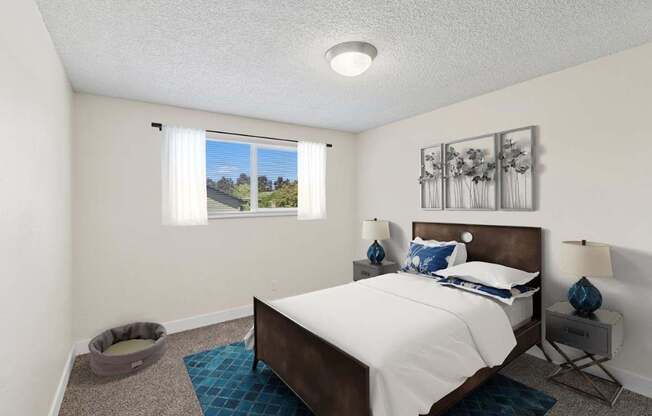 A bedroom with a large bed and a dog bed.