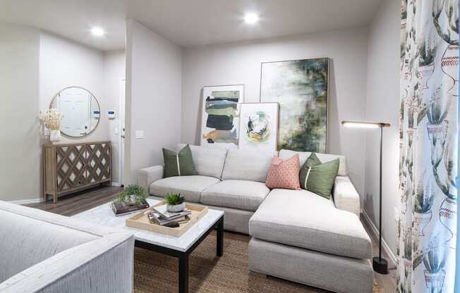 a living room with a couch and a coffee table