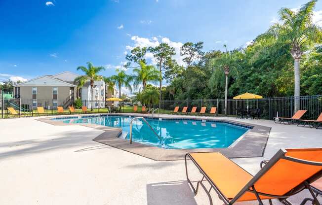 Outdoor pool with lounge seating