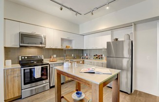 Sparc Apartments Model Kitchen and Island