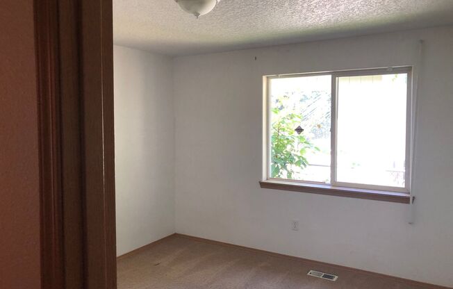 3 Bed, 2 Bath with Garage, W/D, and Fenced Yard in Montavilla