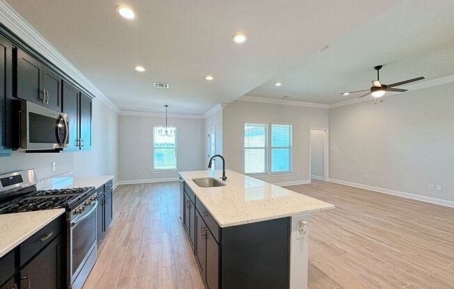 3 Bedroom House located off Burbank that sits on the Community Lake