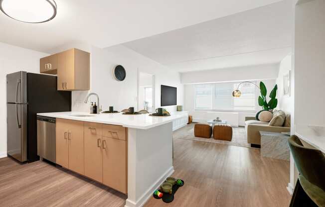 an open kitchen and living room in an apartment