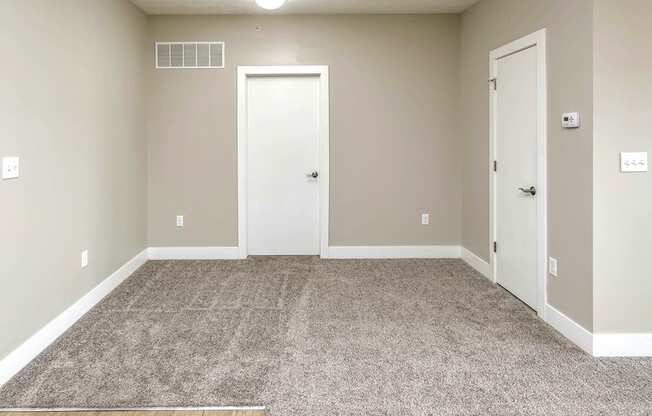 Living Room with Large Entry Way at Tamarin Ridge in Lincoln, NE