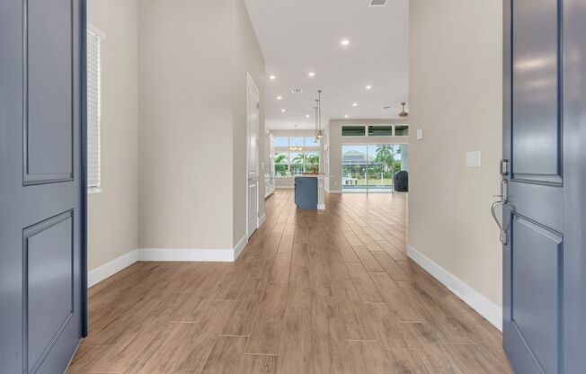 4 Bedroom 3.5 Bath Waterfront  Pool Home in Gated Community