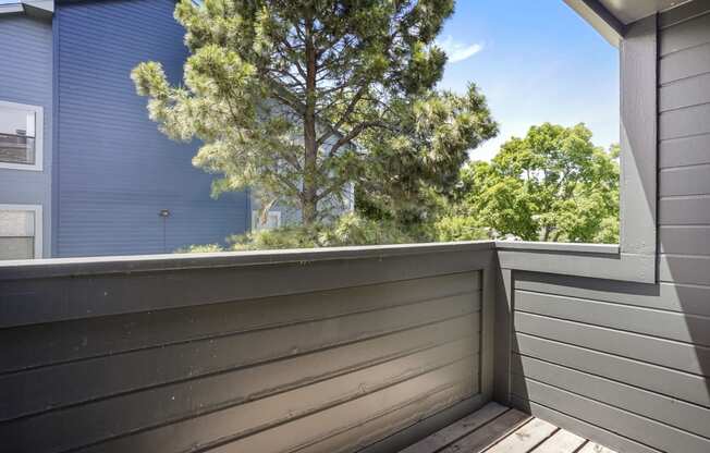 A balcony at Hilltop View Apartments