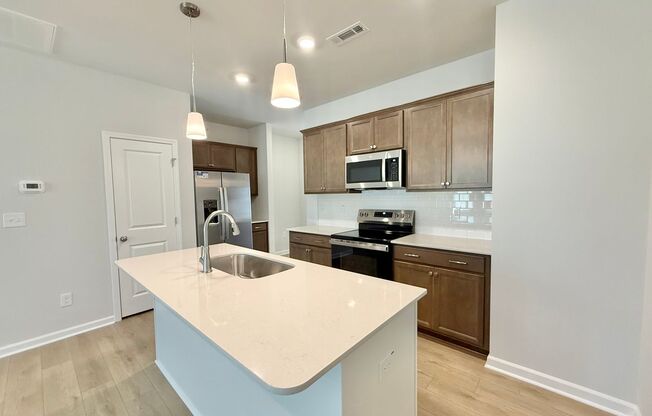 **OFFERING REFUNDABLE APPLICATION FEES** New Construction 3BD, 2.5BA Garner Townhome with a 1-Car Garage in an HOA Community with Premier Amenities Near White Oak Crossing