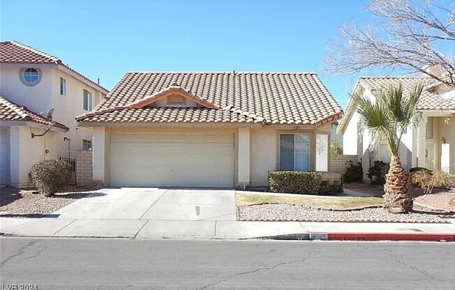 Step into this charming 3-bedroom, 2-bathroom residence in Henderson