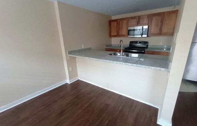 2 beds, 1.5 baths, 1,136 sqft, $1,477, Unit 107