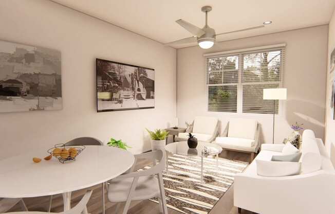 a living room with white furniture and a white table and chairs at Brownstones at Palisade Park, Colorado, 80023