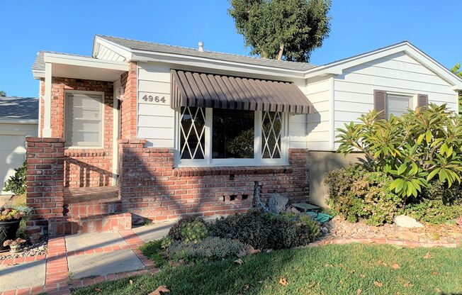 Charming Talmadge Home. 3 Bedroom/2 bath PLUS Dedicated Office. A Must See!