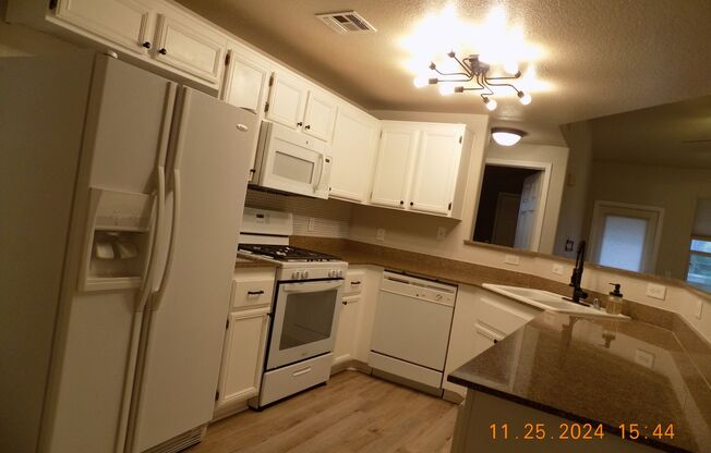 Well maintained up stairs condo