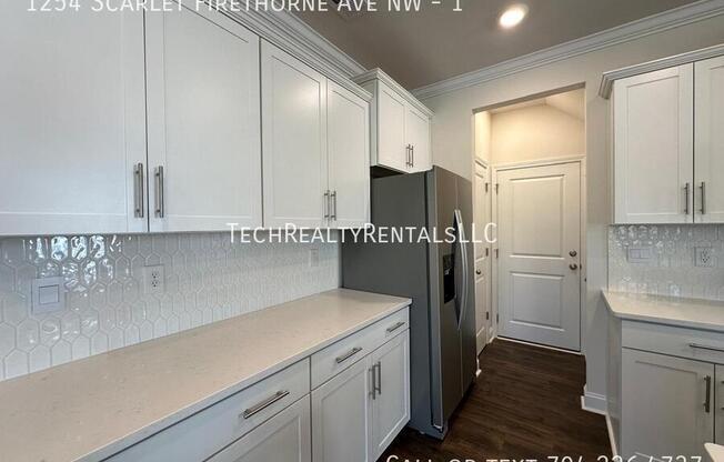 1254 SCARLET FIRETHORNE AVE NW