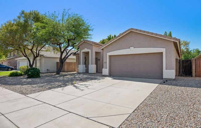 Absolutely beautiful 4 bedroom, 2 bathroom with 2 car garage in Dove Valley Ranch available for move in NOW!!  Backyard is a peaceful Oasis with Faux grass for easy care!!!  Close to TSMC!!!