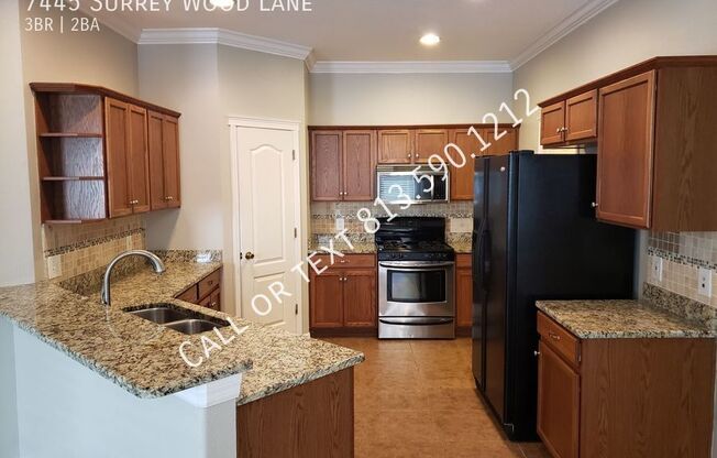 7445 SURREY WOOD LN