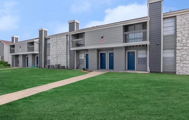 a large lawn in front of a building