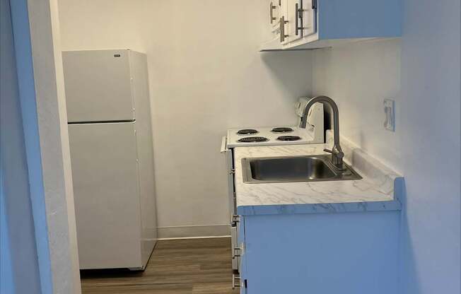 WELCOME TO WOODLAND ARMS APARTMENTS