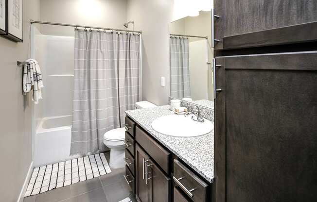 Luxury studio, one, and two bedroom apartment homes featuring granite countertops, stainless steel appliances, and fireplaces at East Lake Flats in Lincoln, NE