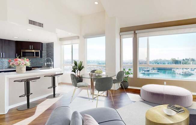 A modern living room with a bar area and a view of the water at Esprit Marina del Rey, 90292