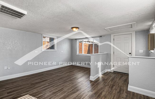 Quaint Home with Fenced Yard and Detached Garage!