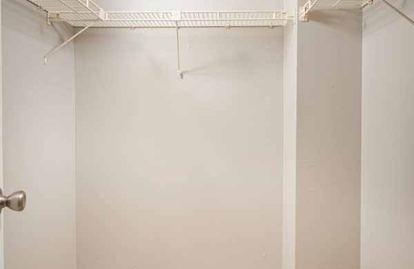 an empty bathroom with a white wall and an empty closet at Fairways of Inverrary, Lauderhill, 33319