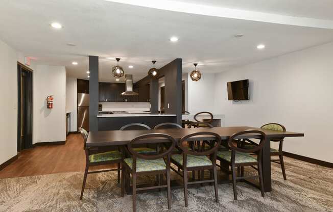 The Edge of Uptown Apartments | Community Room Dining Area