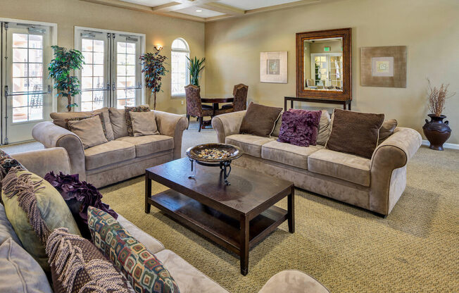 a living room with couches and a coffee table  at Falcon Bridge at Gale Ranch, San Ramon, CA