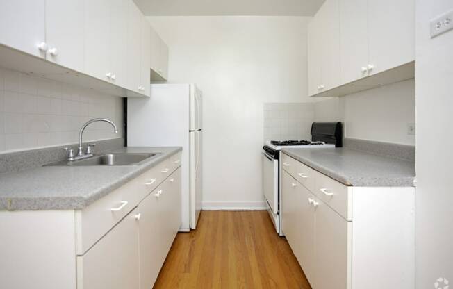 The Edison apartments kitchen with white cabinetry