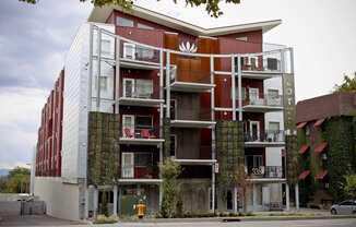 exterior of red brick building at The Lotus Apartments in Downtown Salt Lake City, Utah