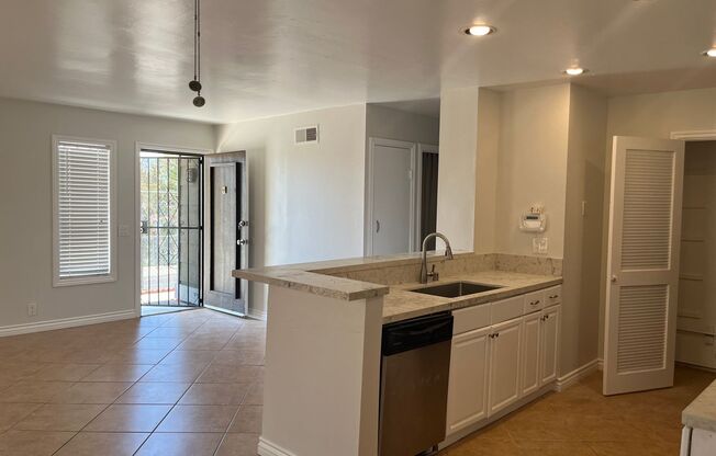 Beautiful 2 Bedroom/1 Bath Floor Level Remodeled Townhome with Two Patios! $2,575.00