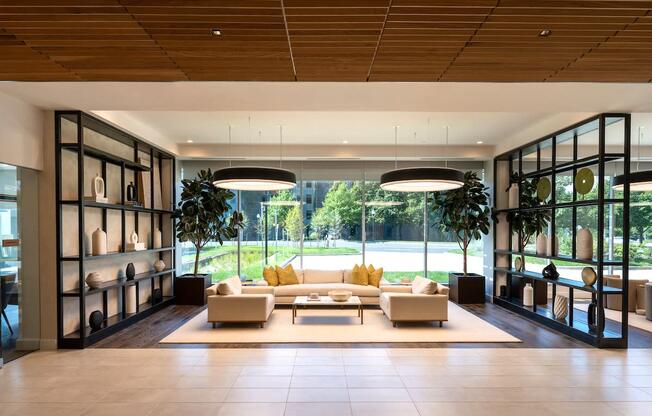 a large living room with a couch and a table at Sinclaire on Seminary, Alexandria, VA