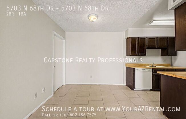 5703 N 68 DR
